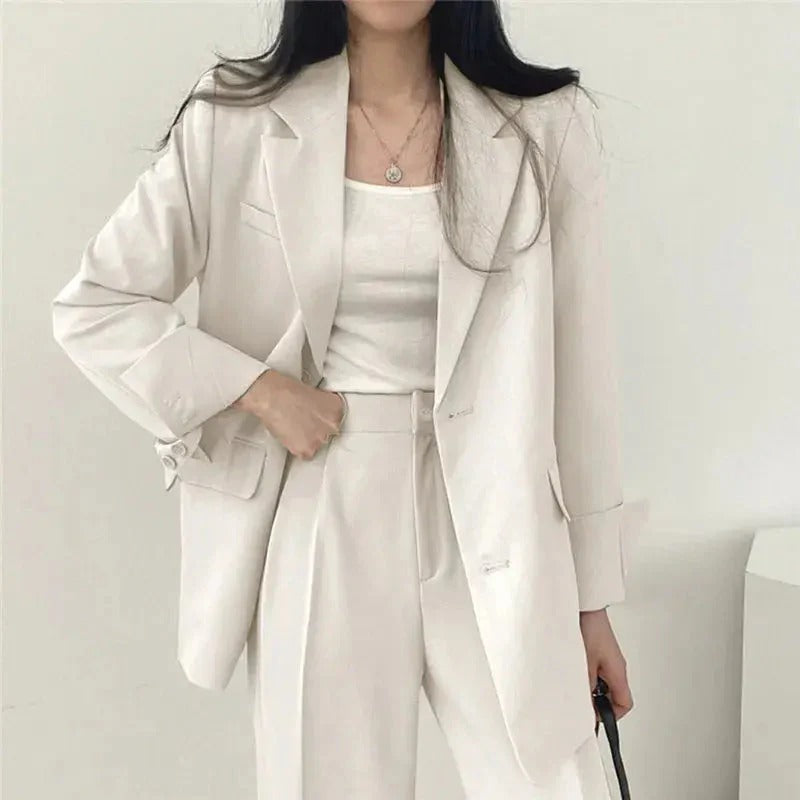 Conjunto de traje de mujer con blazer entallado y pantalones de pierna ancha